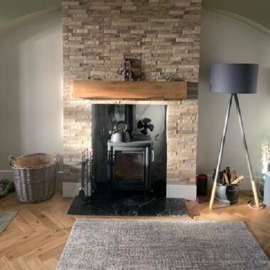 Customer fireplace with Ordino Oyster Split Face Tiles