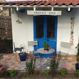 Garden Greek Taverna with rustic Provence tiles