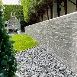 Customer garden wall with split face tiles