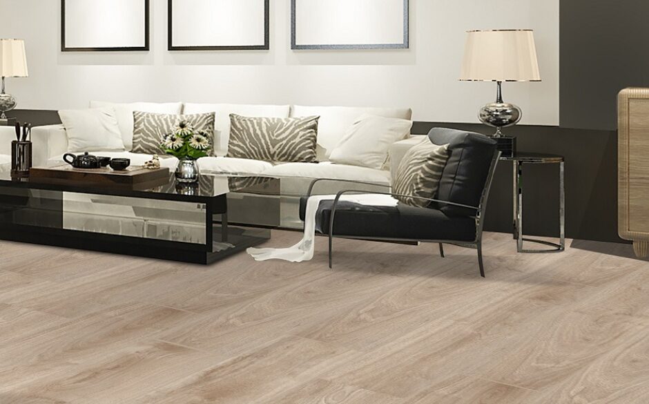 wood effect tiles on the floor in a living room setting with a sofa and chaies