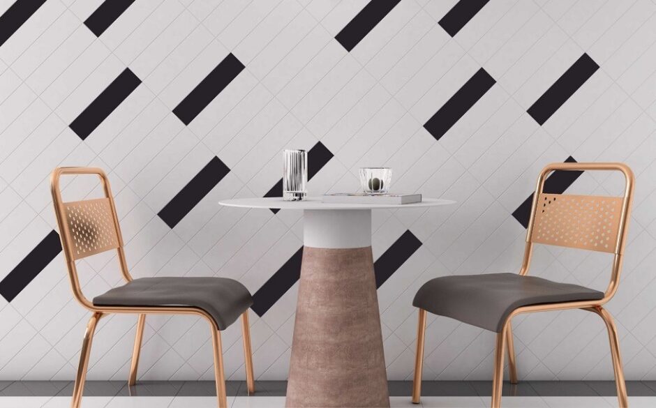 Kitchen diner with a table and two chairs. White and black tiles on the diagonal in a funky pattern.