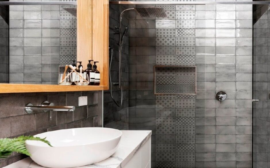Grey decorative tiles in a shower setting