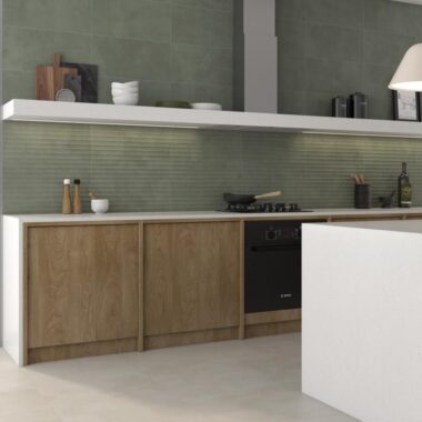 Sage Kitchen Tiles in a modern kitchen with large window and breakfast bar