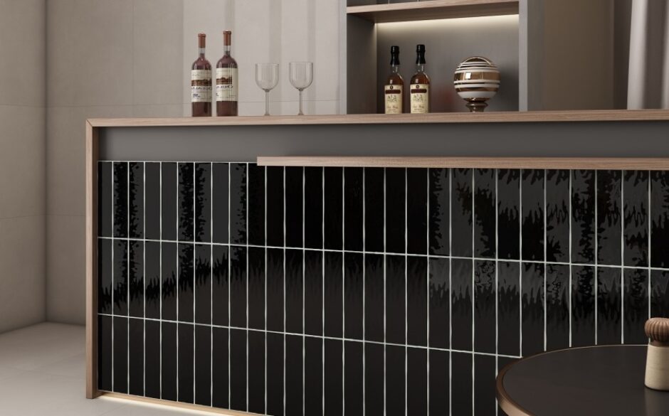 Closeup of Linear Tiles – Black, Gloss on the panelling of a kitchen breakfast bar.