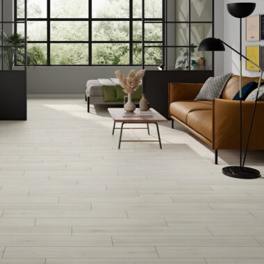 Nordby White Porcelain Wood Tile Flooring in a Living Room Setting