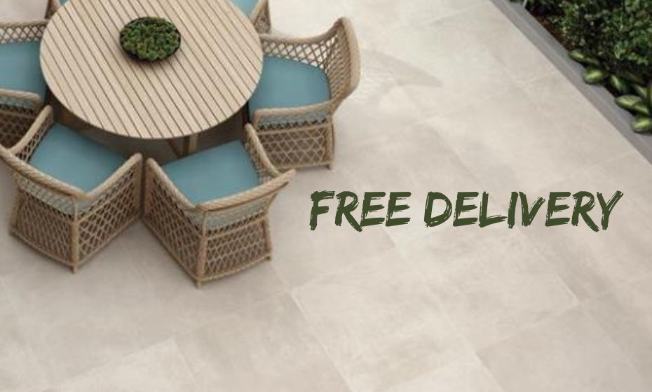 Free Delivery banner - garden patio with a round table and beige tiles