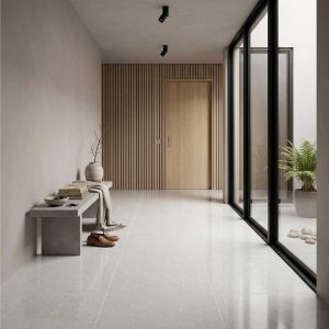 Midas Pearl Grey large gloss porcelain floor tiles in a bright modern interior with large-format design and minimalist styling.