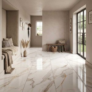 Miami Big Marble porcelain floor tiles in a bright contemporary hallway with polished marble-effect finish and gold veining.